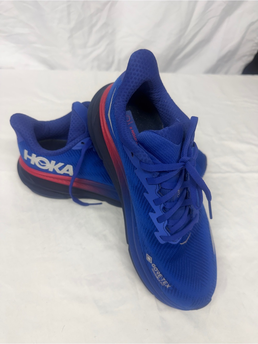 Hoka women’s Royal Blue Athletic Running Shoes with Red Accent - Clifton 9 GTX